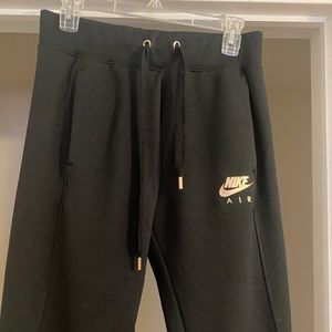 Womens black Nike joggers - gold lettering